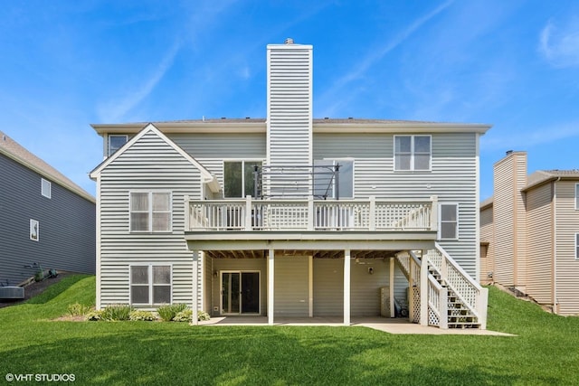 6 Valhalla Ct, Lake In The Hills, IL 60156 - rear view of property with a deck, a patio, a chimney, a lawn, and stairway