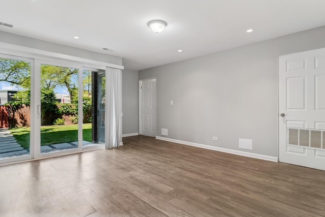 2717 S Michigan Ave, Chicago, IL 60616 - unfurnished room featuring wood finished floors, baseboards, and recessed lighting