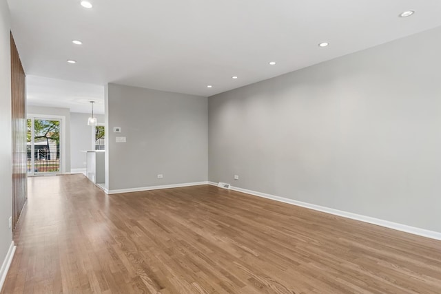 2717 S Michigan Ave, Chicago, IL 60616 - spare room with baseboards, light wood-type flooring, and recessed lighting
