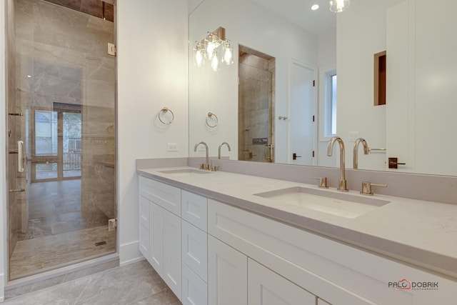 1649 Mount Pleasant St, Northfield, IL 60093 - bathroom featuring double vanity, a stall shower, marble finish floors, and recessed lighting