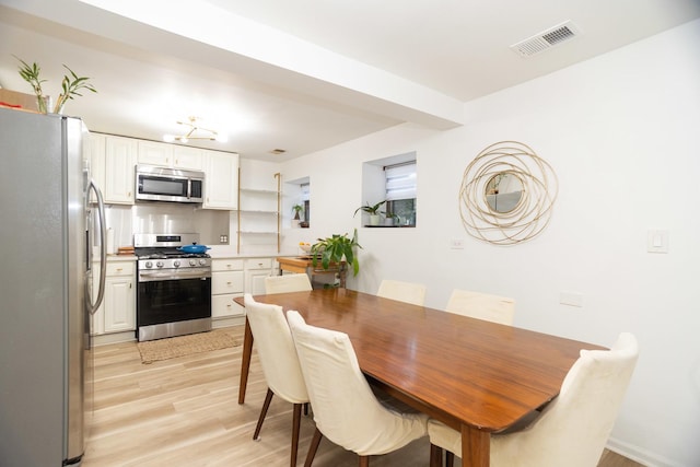 4336 N Kenmore Ave Unit G, Chicago, IL 60613 - dining room featuring light wood-style floors