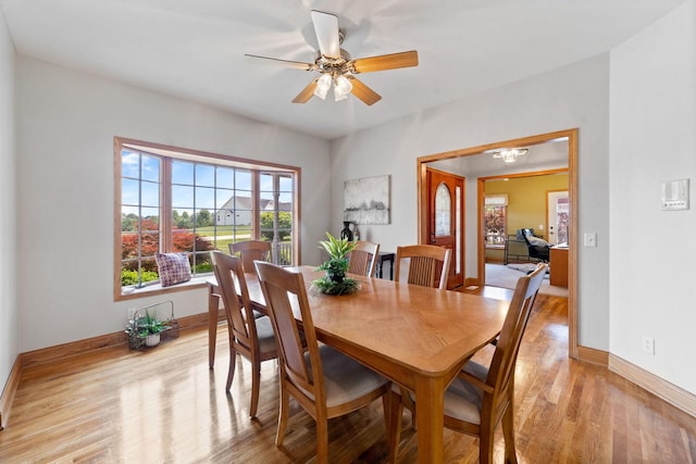 6099 Polo Club Dr, Yorkville, IL 60560 - dining area featuring light wood finished floors and ceiling fan