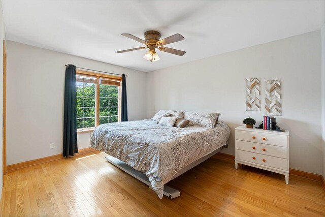 6099 Polo Club Dr, Yorkville, IL 60560 - bedroom featuring light wood-type flooring and a ceiling fan