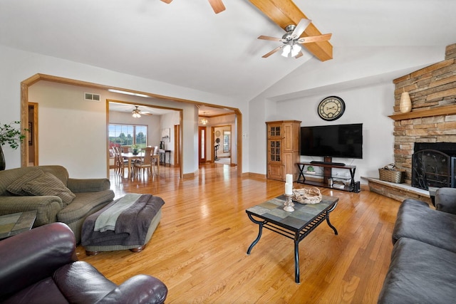 6099 Polo Club Dr, Yorkville, IL 60560 - living area featuring ceiling fan, beam ceiling, light wood-style floors, high vaulted ceiling, and a fireplace