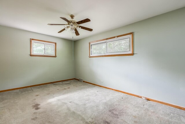 1808 Laurel Ave, Evanston, IL 60201 - carpeted spare room with healthy amount of natural light, baseboards, and ceiling fan
