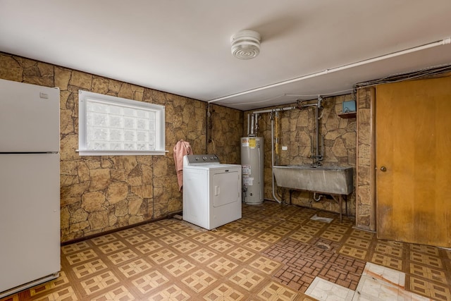 1808 Laurel Ave, Evanston, IL 60201 - laundry room with washer / clothes dryer, water heater, light flooring, and a wood stove