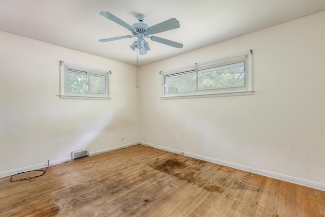 1808 Laurel Ave, Evanston, IL 60201 - spare room with baseboards, hardwood / wood-style floors, and ceiling fan