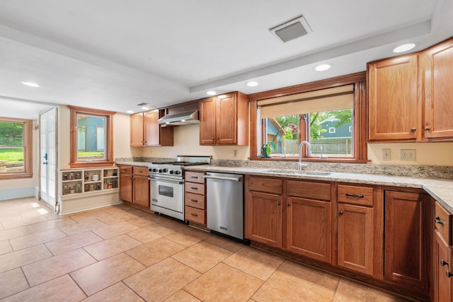 1616 Riverside Ave, Saint Charles, IL 60174 - kitchen featuring appliances with stainless steel finishes, recessed lighting, range hood, light stone counters, and light tile patterned floors