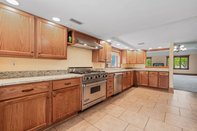 1616 Riverside Ave, Saint Charles, IL 60174 - kitchen featuring appliances with stainless steel finishes, under cabinet range hood, plenty of natural light, a chandelier, and recessed lighting