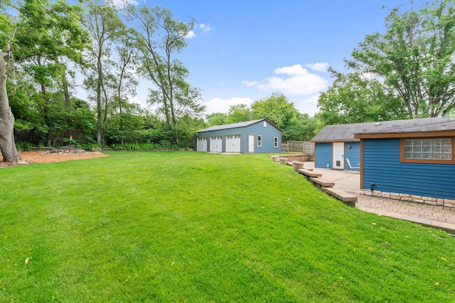 1616 Riverside Ave, Saint Charles, IL 60174 - view of grassy yard with an outbuilding and a detached garage