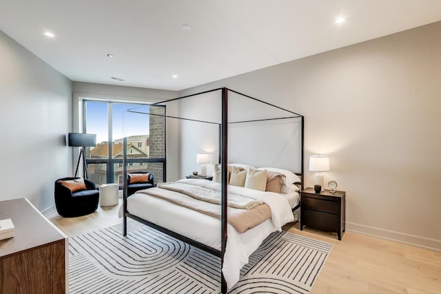 613 N Ogden Ave Unit 4W, Chicago, IL 60642 - bedroom featuring light wood-style flooring and recessed lighting