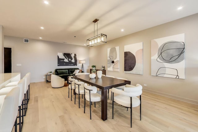 613 N Ogden Ave Unit 4W, Chicago, IL 60642 - dining room with light wood-style floors and recessed lighting