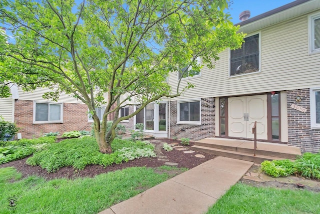 3030 Roberts Dr Unit 4, Woodridge, IL 60517 - view of front facade with brick siding
