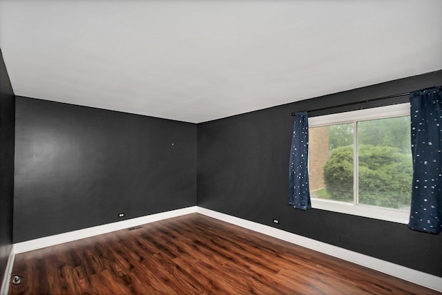 3030 Roberts Dr Unit 4, Woodridge, IL 60517 - spare room featuring wood finished floors and baseboards