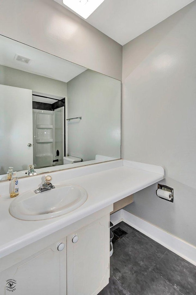 3030 Roberts Dr Unit 4, Woodridge, IL 60517 - bathroom featuring a shower, vanity, and toilet