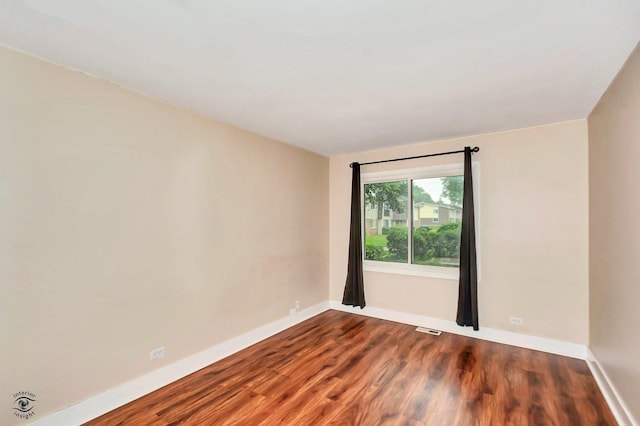 3030 Roberts Dr Unit 4, Woodridge, IL 60517 - spare room with wood finished floors and baseboards