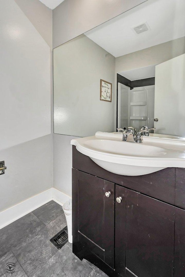 3030 Roberts Dr Unit 4, Woodridge, IL 60517 - bathroom with vanity and baseboards