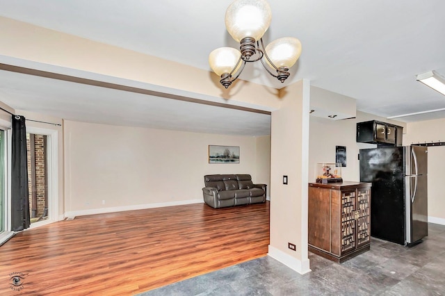 3030 Roberts Dr Unit 4, Woodridge, IL 60517 - living area with baseboards and a chandelier