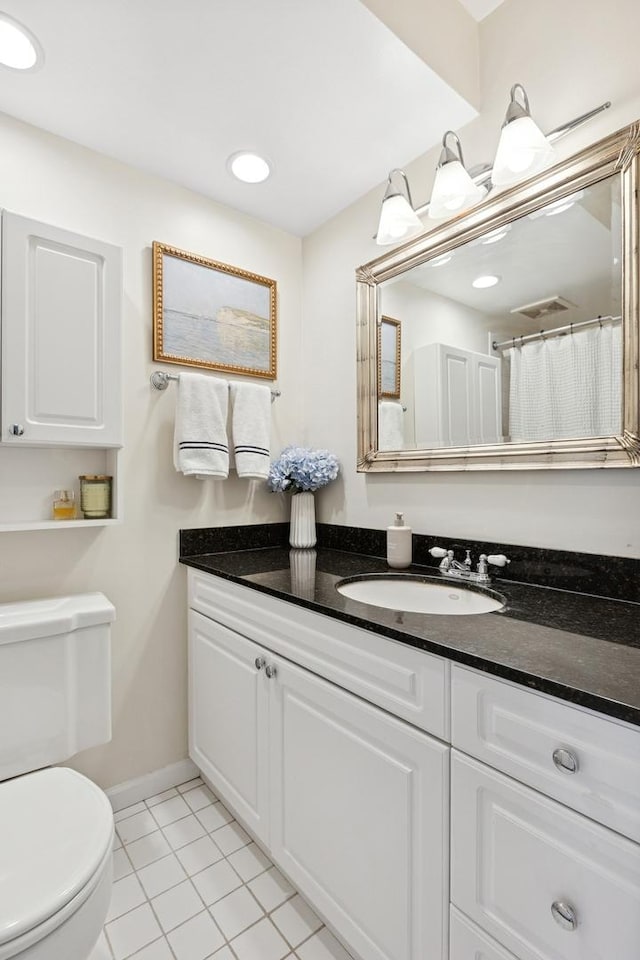 1400 N State Pkwy Unit 9F, Chicago, IL 60610 - bathroom with vanity and tile patterned flooring