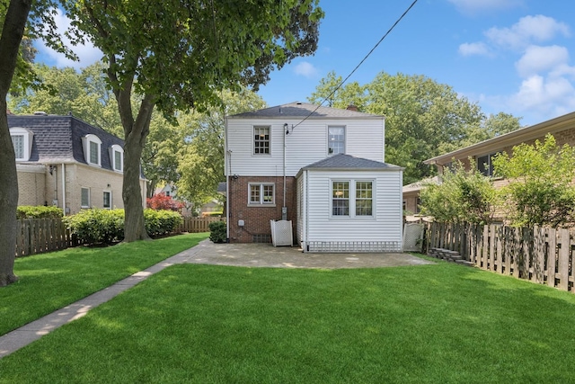 8335 Kostner Ave, Skokie, IL 60076 - rear view of house with a patio, brick siding, and a chimney