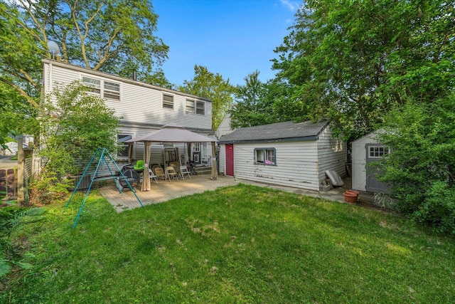 475 S Edison Ave, Elgin, IL 60123 - rear view of house with a gazebo and a storage unit