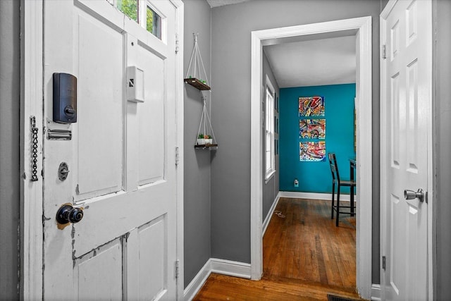 475 S Edison Ave, Elgin, IL 60123 - entryway featuring baseboards and wood finished floors