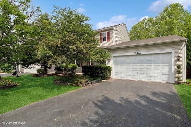 2746 Middleton Ct, Aurora, IL 60503 - view of front of property featuring asphalt driveway, an attached garage, and a front yard