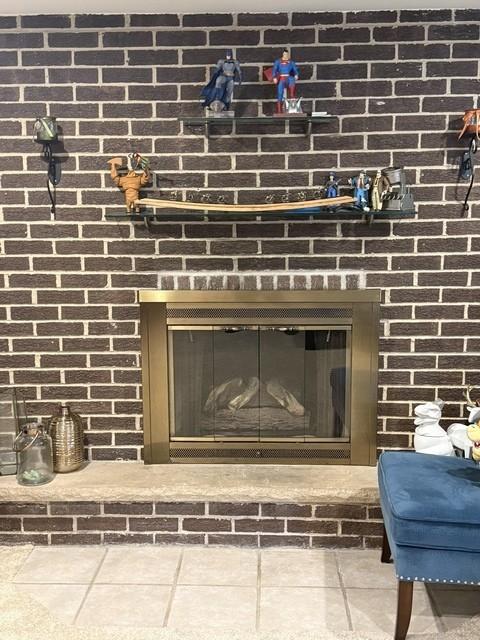 7141 W 72nd St, Chicago, IL 60638 - detailed view of brick wall and a brick fireplace