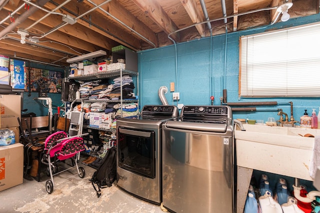 7141 W 72nd St, Chicago, IL 60638 - laundry room featuring washer and clothes dryer and concrete block wall