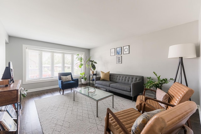 7141 W 72nd St, Chicago, IL 60638 - living room featuring dark wood-style floors and baseboards