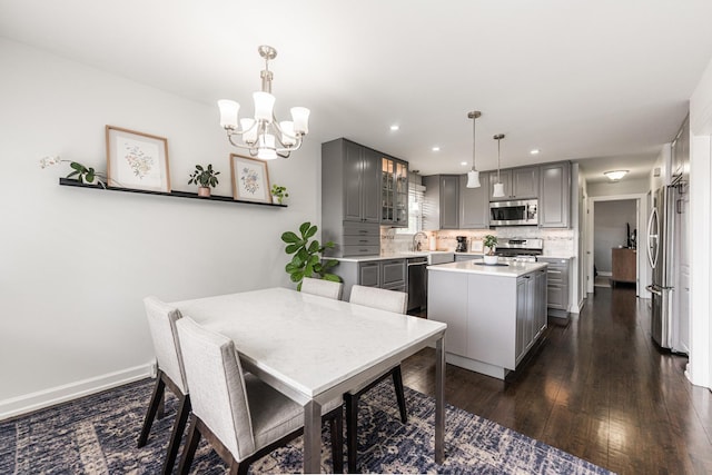7141 W 72nd St, Chicago, IL 60638 - dining room with a chandelier, dark wood-style floors, and recessed lighting