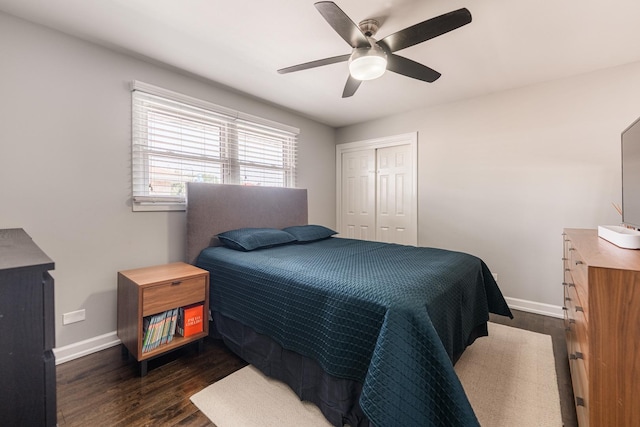 7141 W 72nd St, Chicago, IL 60638 - bedroom with dark wood-style flooring, a closet, and a ceiling fan