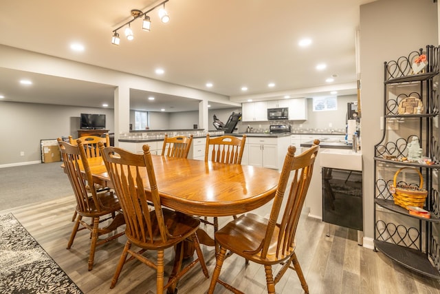608 Cherry Tree Ln, Genoa, IL 60135 - dining area with light wood-type flooring, recessed lighting, and baseboards