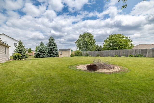 608 Cherry Tree Ln, Genoa, IL 60135 - view of yard with an outdoor fire pit