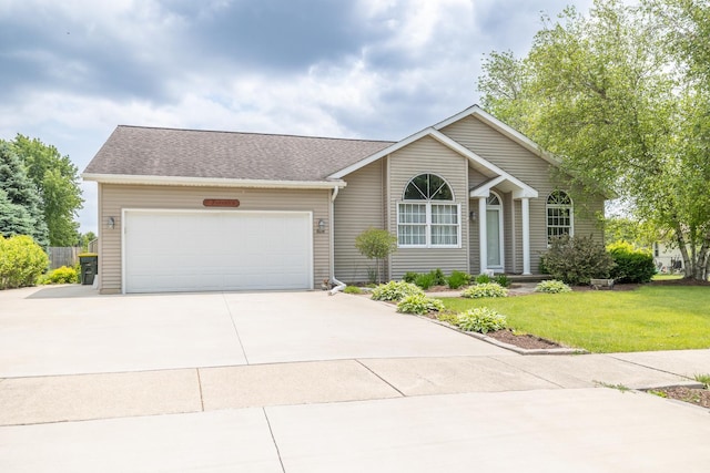 608 Cherry Tree Ln, Genoa, IL 60135 - view of front of property with driveway, a front yard, a garage, and a shingled roof
