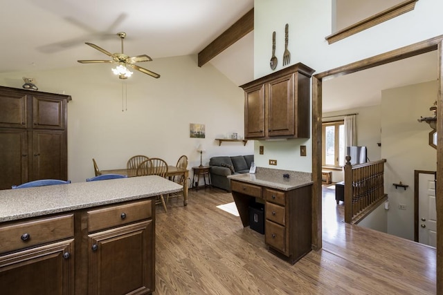 33061 N Rolling Hills Rd, Grayslake, IL 60030 - kitchen with wood finished floors, a ceiling fan, light countertops, and dark brown cabinets