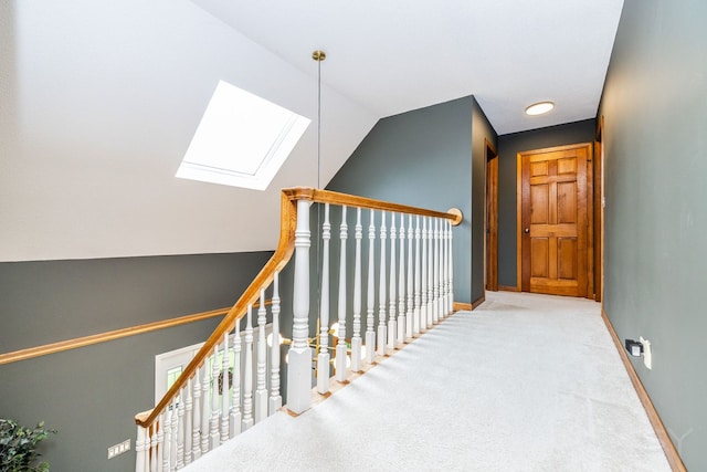 181 N Meadowlark Dr, Hawthorn Woods, IL 60047 - corridor with a skylight, baseboards, carpet flooring, and vaulted ceiling
