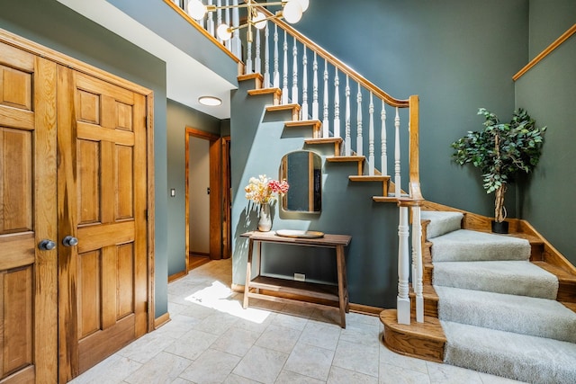 181 N Meadowlark Dr, Hawthorn Woods, IL 60047 - stairs with baseboards and a high ceiling