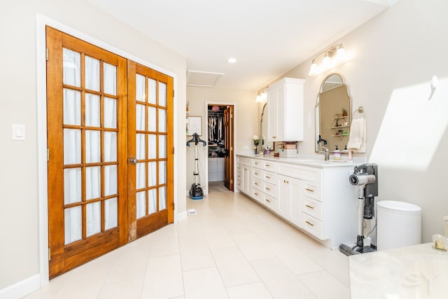 181 N Meadowlark Dr, Hawthorn Woods, IL 60047 - bathroom with double vanity, french doors, a spacious closet, toilet, and recessed lighting