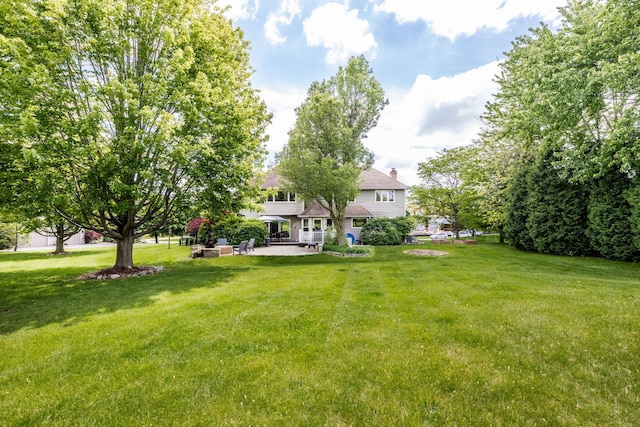 181 N Meadowlark Dr, Hawthorn Woods, IL 60047 - view of green lawn featuring a patio