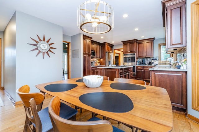 181 N Meadowlark Dr, Hawthorn Woods, IL 60047 - dining room featuring light wood-style flooring, baseboards, recessed lighting, and a chandelier