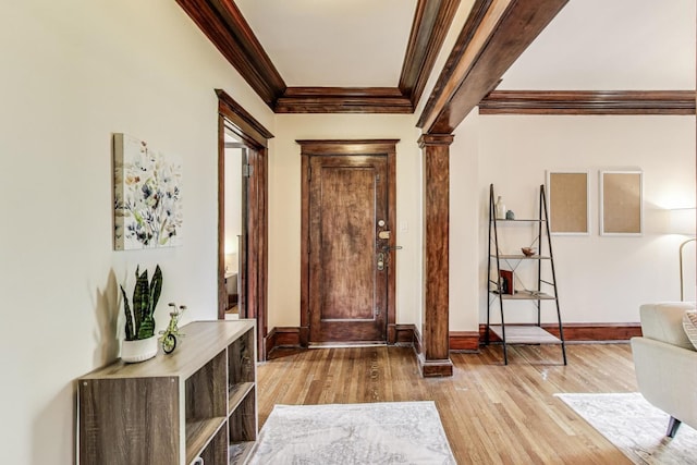 5520 S Cornell Ave Unit 1S, Chicago, IL 60637 - foyer entrance featuring crown molding, hardwood / wood-style floors, and decorative columns