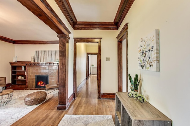 5520 S Cornell Ave Unit 1S, Chicago, IL 60637 - corridor with crown molding, wood finished floors, and ornate columns