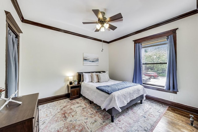 5520 S Cornell Ave Unit 1S, Chicago, IL 60637 - bedroom with light wood finished floors, ornamental molding, and ceiling fan
