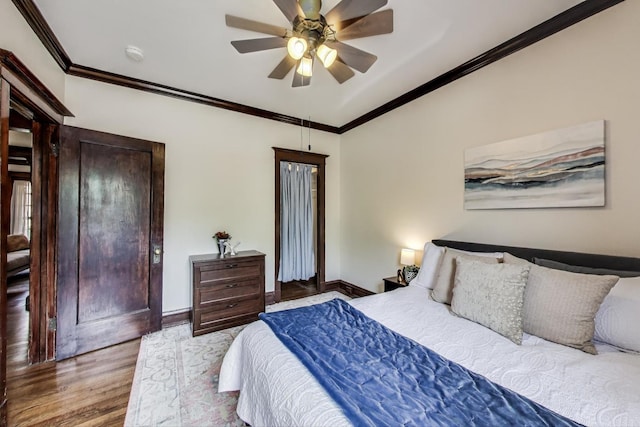 5520 S Cornell Ave Unit 1S, Chicago, IL 60637 - bedroom featuring wood finished floors, crown molding, and ceiling fan