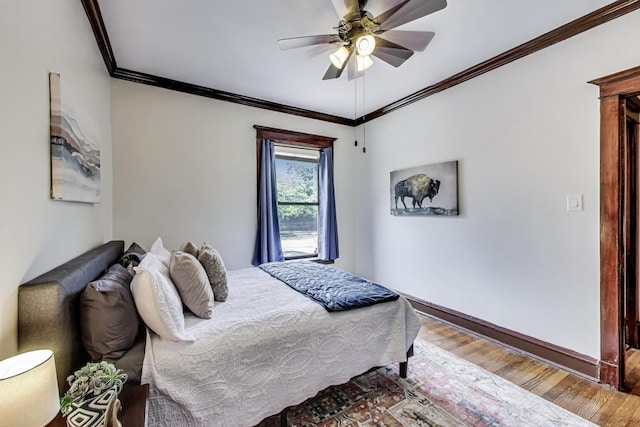 5520 S Cornell Ave Unit 1S, Chicago, IL 60637 - bedroom with crown molding, wood finished floors, and ceiling fan