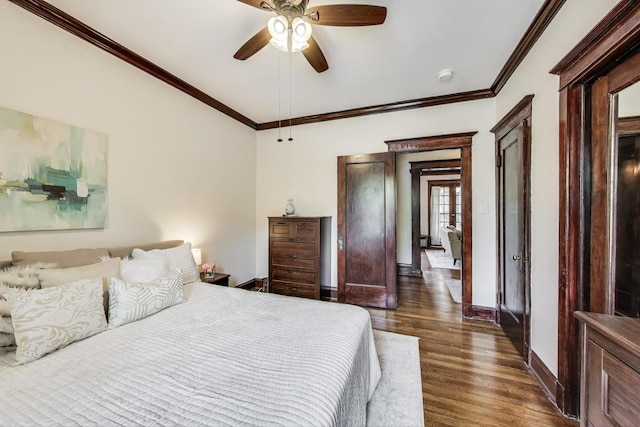 5520 S Cornell Ave Unit 1S, Chicago, IL 60637 - bedroom featuring dark wood-style flooring, crown molding, and a ceiling fan