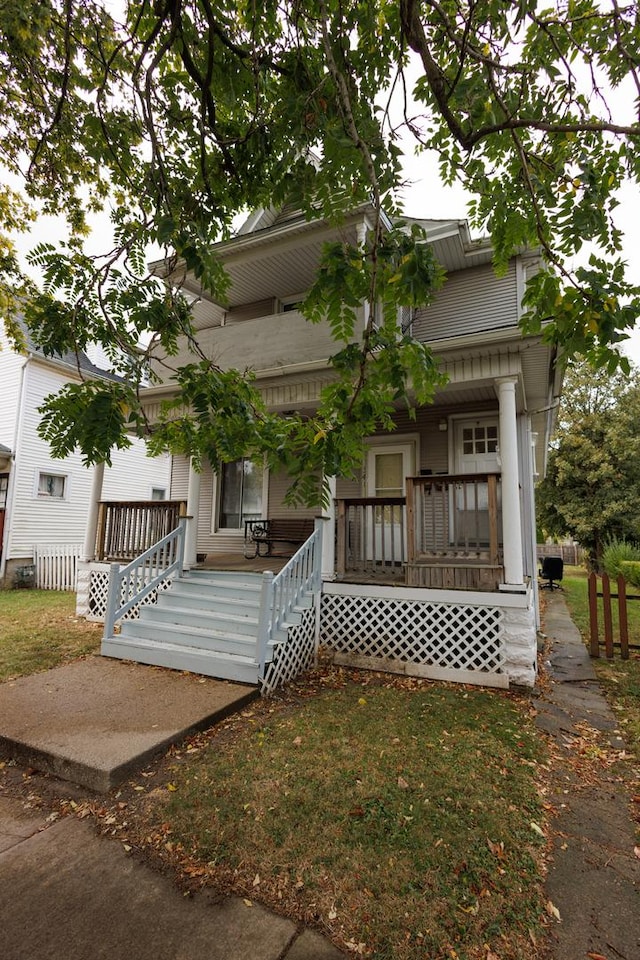 341 S 5th Ave, Kankakee, IL 60901 - view of front facade featuring a porch