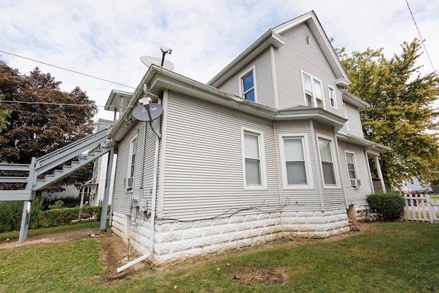 341 S 5th Ave, Kankakee, IL 60901 - view of home's exterior with a lawn
