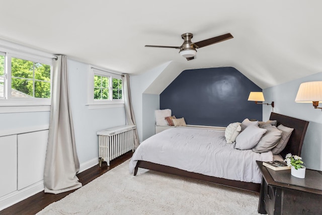 1414 Lincoln St, Evanston, IL 60201 - bedroom with radiator heating unit, vaulted ceiling, wood finished floors, and ceiling fan